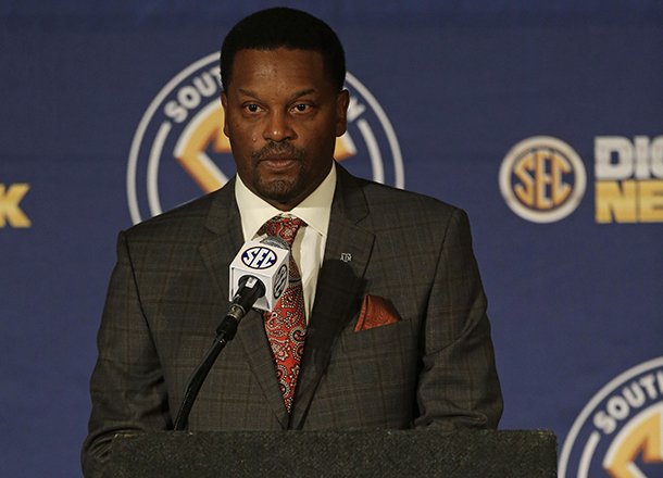 Texas A&M coach Kevin Sumlin talks with reporters during the Southeastern Conference football Media Days in Hoover, Ala., Wednesday, July 17, 2013. (AP Photo/Dave Martin)