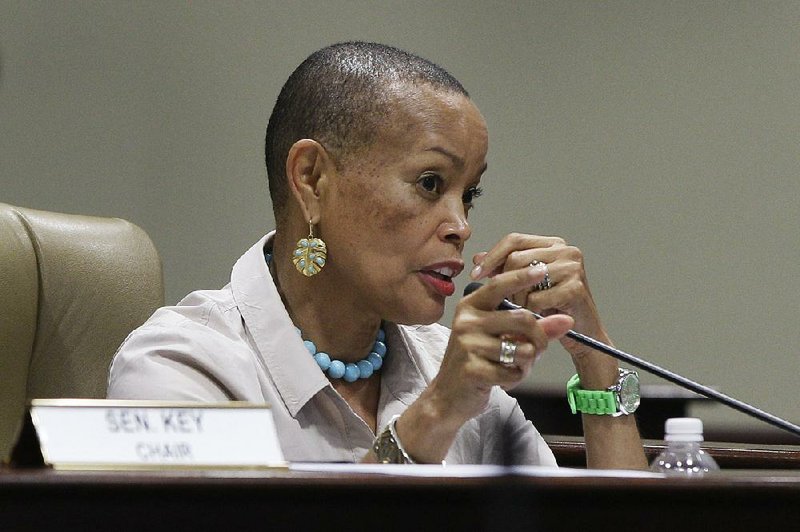 Sen. Joyce Elliott, D-Little Rock, asks a question about Common Core education standards during a meeting of the Joint House and Senate Education Committee at the Arkansas state Capitol in Little Rock, Ark., Monday, July 22, 2013. (AP Photo/Danny Johnston)