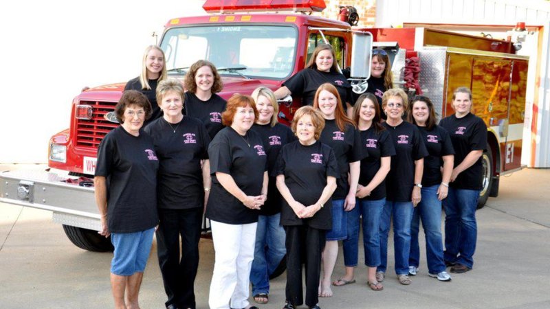 The Wheeler Fire Department’s Ladies’ Auxiliary boasts 13 members, most of whom come from families of the volunteer firefighters. The women work to raise funds to support the department’s work, and they also show up at fire scenes with food and drinks for the working firefighters. 