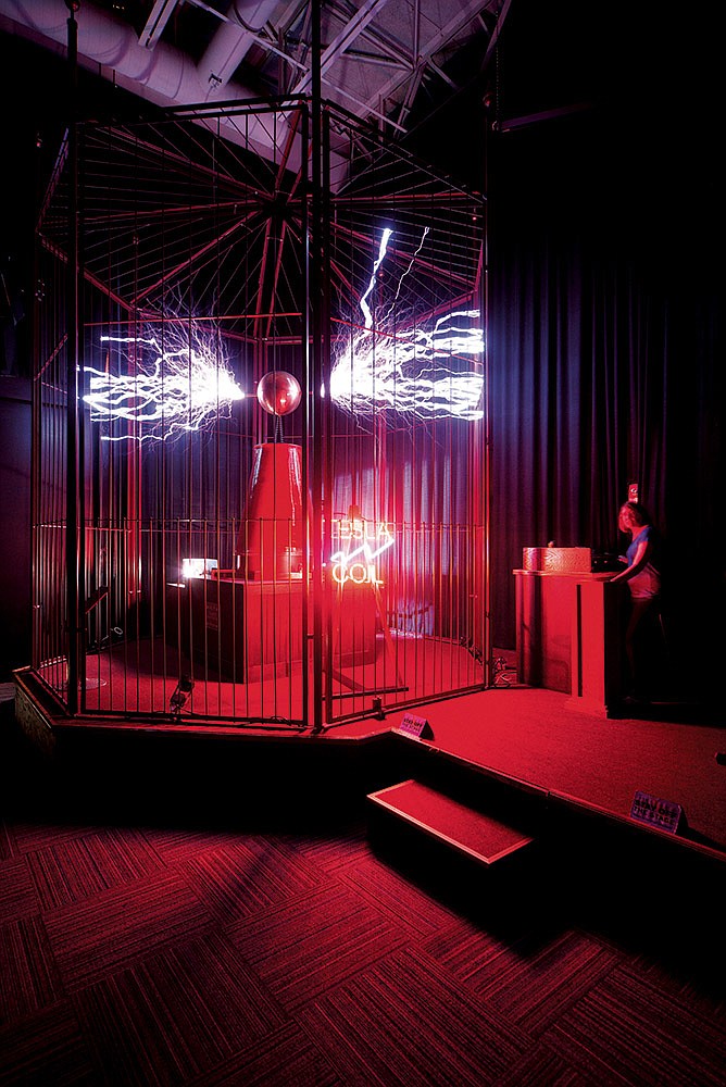 Brooke Ownbey, marketing and volunteer coordinator at the Mid-America Science Museum in Hot Springs, fires up the museum’s massive Tesla coil.