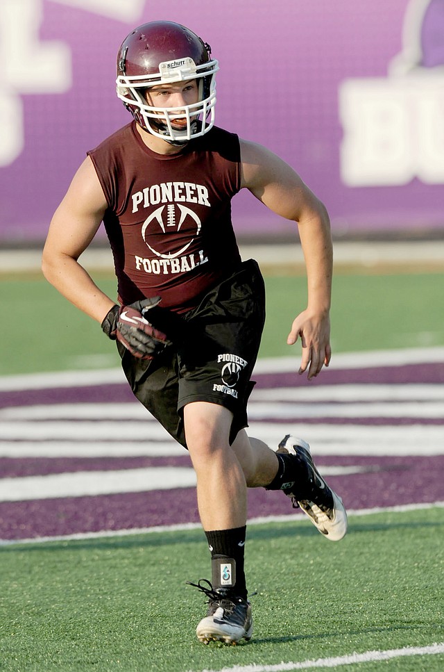 Gentry linebacker Tucker Willett moves toward the play against Huntsville during 7-on-7 play at Harmon Stadium in Fayetteville. 