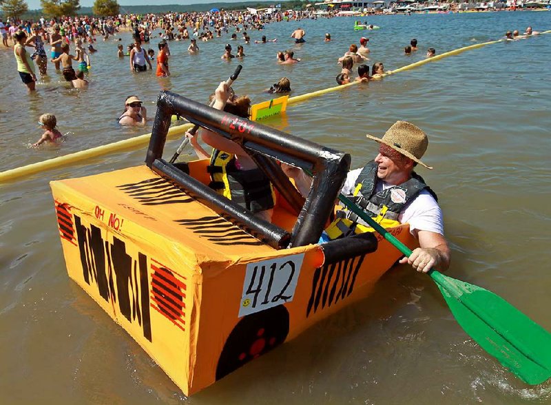 Watercraft of all shapes and sizes compete in the yearly World Championship Cardboard Boat Races at Heber Springs. 