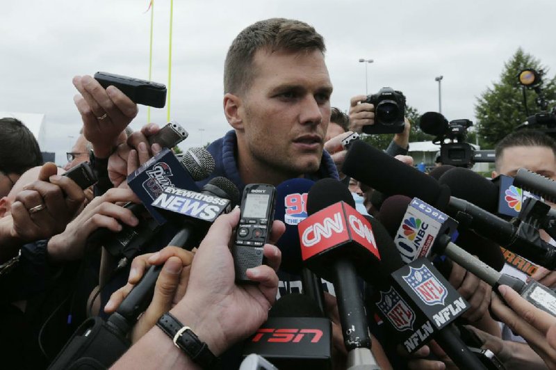New England quarterback Tom Brady said after Thursday’s practice that the Patriots must work hard to “re-establish what we’re all about” in the wake of Aaron Hernandez’s arrest on a murder charge. 
