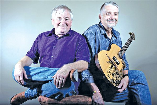 Keith Grimwood, left, and Ezra Idlet have been playing music together for 37 years. They’ll release a new children’s CD, “Rubber Baby Buggy Bumpers,” on Sept. 3. 