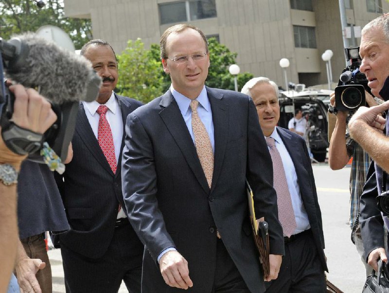Peter Nussbaum, general counsel for SAC Capital Advisors LP, leaves Manhattan federal court Friday in New York. 