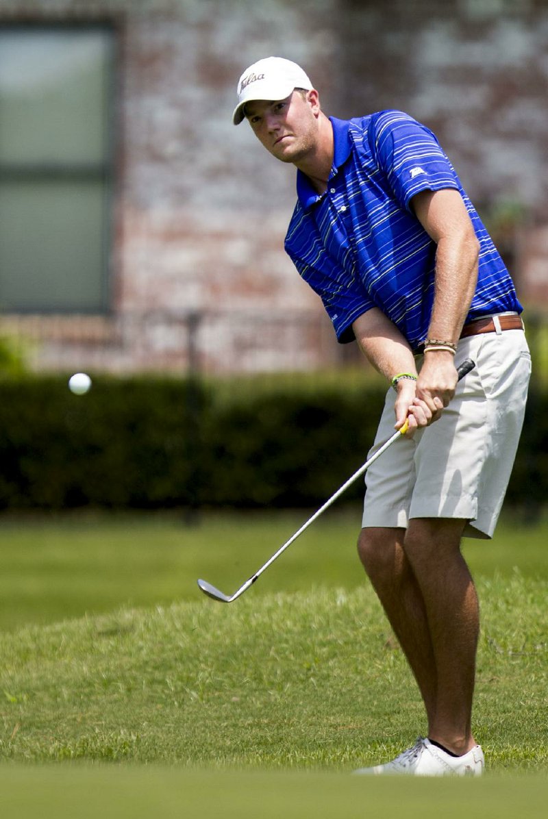 Arkansas Democrat-Gazette/MELISSA SUE GERRITS 07/28/13 - Matt Mabrey makes chips onto the green during the Maumelle Classic Amateur Men's golf tournament at Maumelle Country Club July 28, 2013. 