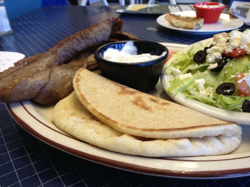 Leo’s Gyros Platter offers a generous portion of sliced roasted meat with pita and tzatziki; you can substitute, as we did, a Greek salad for the fries. 