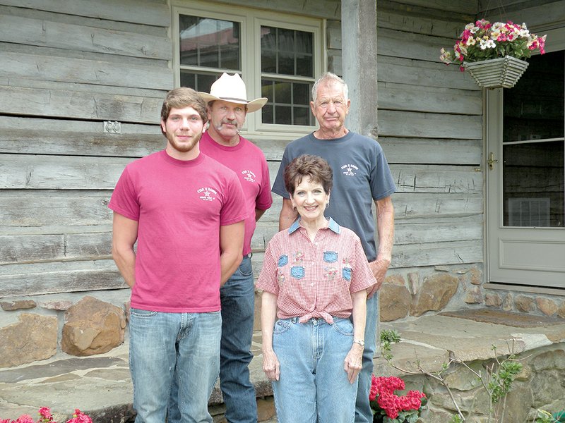 The Bill Hunt family of Greers Ferry is the 2013 Cleburne County Farm Family of the Year. Family members include, front row, from the left, Aaron Hunt and Shelby Hunt; and back row, from the left, John Hunt and Bill Hunt.