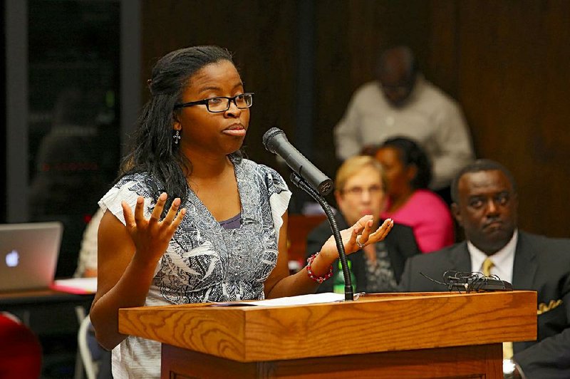 8/11/13
Arkansas Democrat-Gazette/STEPHEN B. THORNTON
Monica Barnett addresses the Arkansas Board of Education about her request to transfer her daughter from the Forrest City district to the Wynn School District during the board's meeting Monday morning in Little Rock.