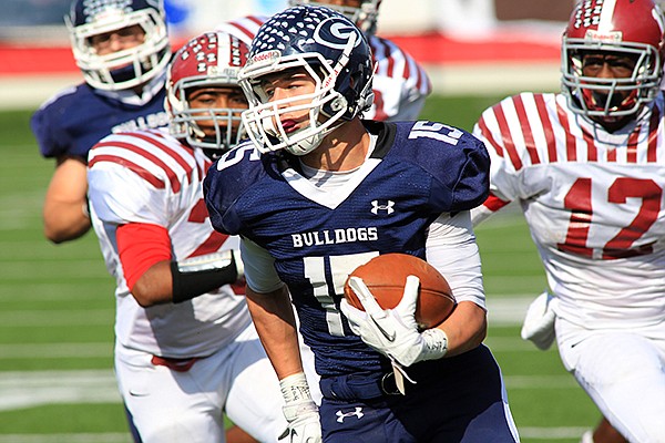 Greenwood's Drew Morgan runs for a touchdown in the first quarter of the 6A state championship football game Saturday, Dec. 1, 2012 at War Memorial Stadium in Little Rock. 