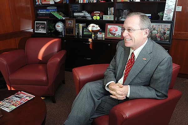Jeff Long, athletic director for the University of Arkansas, talks to a reporter Friday, Dec. 21, 2012, in his office at the Frank Broyles Athletic Center in Fayetteville.