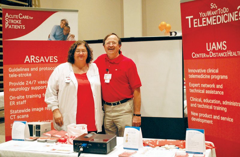 Janie Evans, White River Medical Center clinical educator/trauma program manager, and AR SAVES Community Health Educator Rick Washam educate the public on strokes at Health First, a White River Medical Center community event. Evans and White River Medical Center recently received awards at the AR SAVES Telestroke conference in Little Rock for their work with stroke patients.