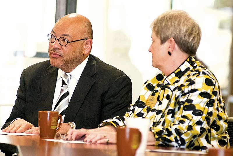 Lewis Shepard, left, vice president of student and external affairs at Henderson State University, and Sally Carder, president of National Park Community College, signed an agreement in 2011 between the two schools at the offices of the Greater Hot Springs Chamber of Commerce. Under the agreement, Henderson now offers degrees in education and three business degrees, including a Master of Business Administration degree.