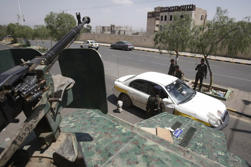 Yemeni soldiers inspect a car at a checkpoint on a street leading to the U.S. and British embassies in Sana on Saturday when security had been tightened because of al-Qaida threats. 