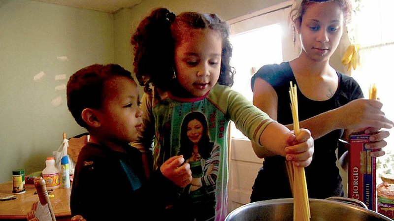 Barbie, a single mother of two young children, struggles to feed her family healthy fare in A Place at the Table, a documentary about food insecurity in America.