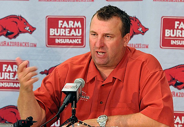 Arkansas coach Bret Bielema speaks at a press conference during media day Sunday, Aug. 11, 2013 at the Fred W. Smith Football Center in Fayetteville.