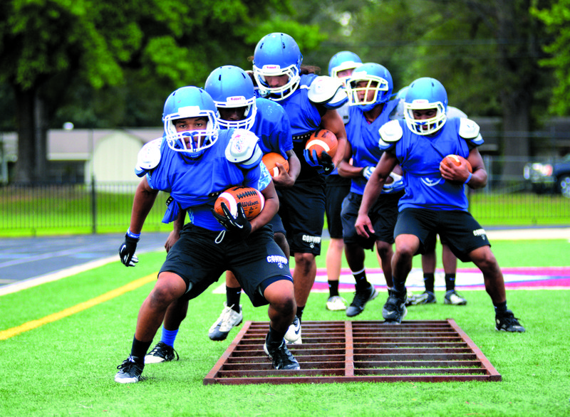 Conway lineman work on agility.