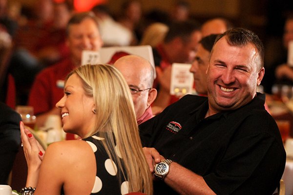 University of Arkansas head football coach Bret Bielema, right, with his wife Jen Bielema at the Razorback Football Kickoff Luncheon Friday, Aug. 23, 2013 at the Northwest Arkansas Convention Center in Springdale.
