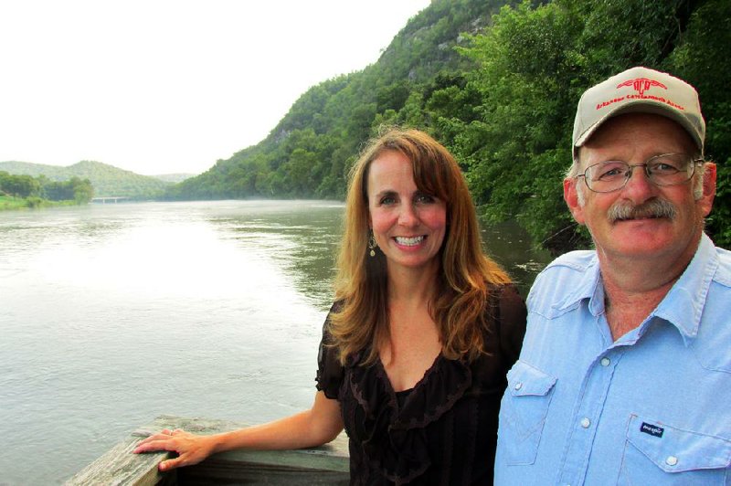 State Sen. Missy Irvin, R-Mountain View, poses on the White River with Dan Stewart, president of the Stone County Cattlemen’s Association. The Blueway plan appeared “in the dark of night,” Irvin, a staunch opponent of the plan, said. Stewart said the lack of public debate angered him. 