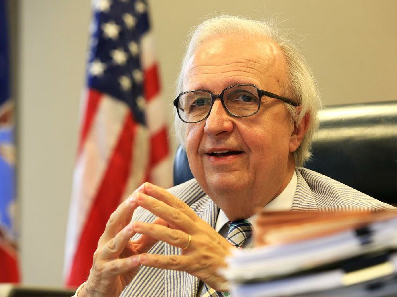  Arkansas Democrat-Gazette/STATON BREIDENTHAL --8/16/13-- Judge Morris Arnold talks about his time as federal judge Friday afternoon in his Little Rock office. Arnold is retiring on Sept. 1.