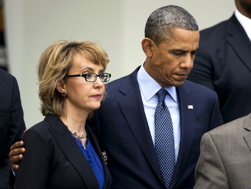 President Barack Obama, accompanied by former Rep. Gabrielle Giffords of Arizona who was badly wounded in a mass shooting, spoke in April on reducing gun violence. The Obama administration introduced new steps Thursday aimed at curbing gun violence, including restrictions on the import of military-surplus weapons. 