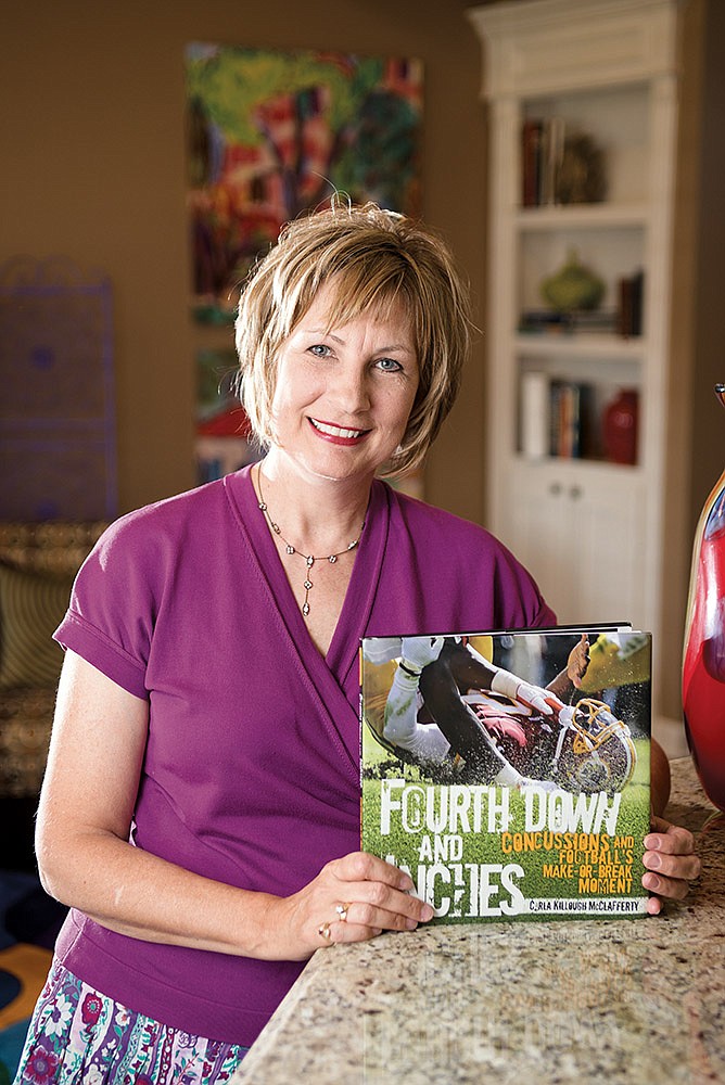 Carla Killough McClafferty of Benton has written a new book about concussions in football.