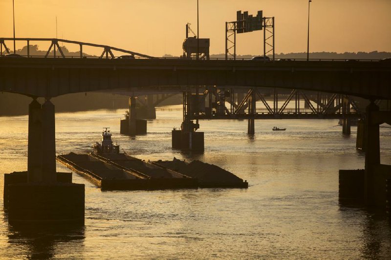 Arkansas Democrat-Gazette/MELISSA SUE GERRITS 08/29/13 - The towboat George Rowe pushes barges under the 1-30 bridge in Little Rock August 29, 2013. 