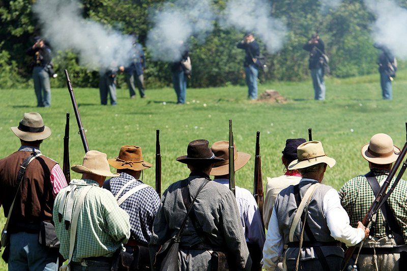 Men portraying Union and Confederate soldiers re-enact the Aug. 27, 1863, Civil War battle at Reed’s Bridge in Jacksonville in 2011. Visitors will have the opportunity to see similar events Sept. 6-8.