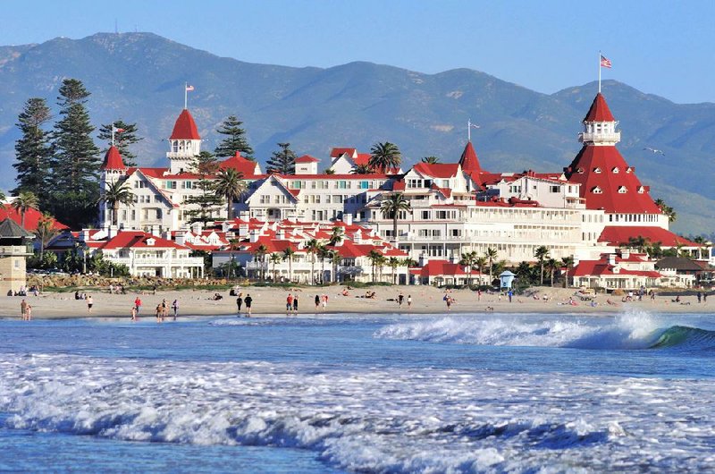 The majestic Hotel del Coronado towers over the beach on Coronado Island. The hotel is proud of its resident ghost, young Kate Morgan. 