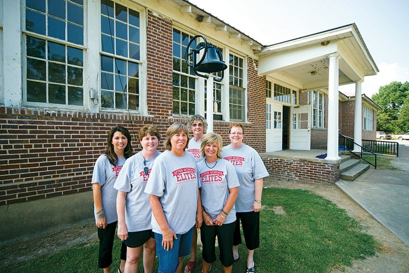 Dana McKinney, from the left,  Brenda Poole, Renee Garr, Davissa Brimer, Linda Jennings and Lois Blanton are volunteering for the after-school program at the old Russell school.