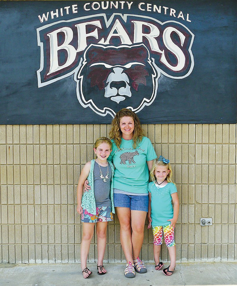 White County Central High School graduate Sara Moffett, shown with her daughters Taylor, left, and Lily, right, enjoys volunteering at the school and was instrumental in starting the district’s first PTO.