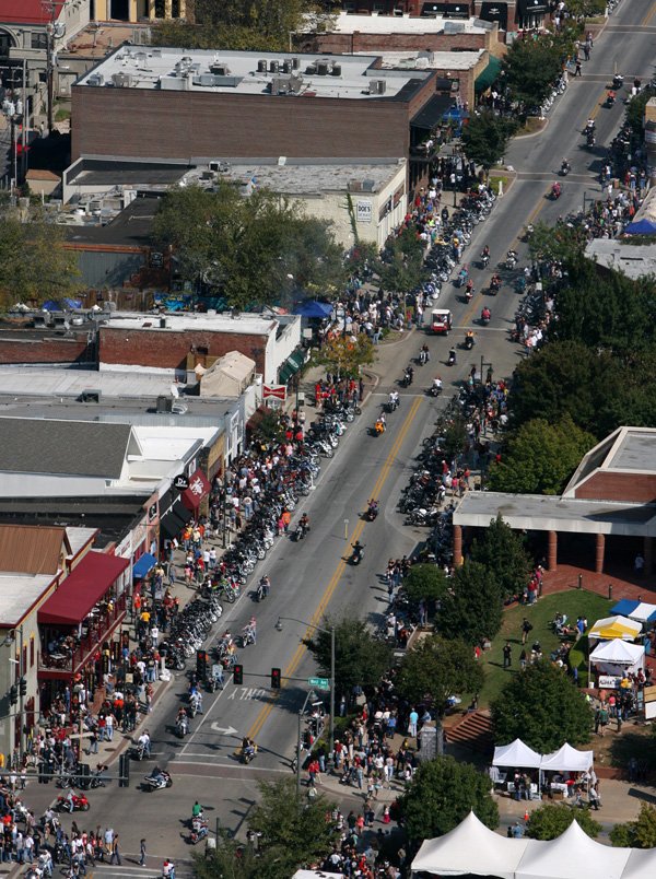Motorcycles line Dickson Street during Bikes, Blues, and BBQ on Saturday afternoon in Fayetteville.  9-27-08 focus nw