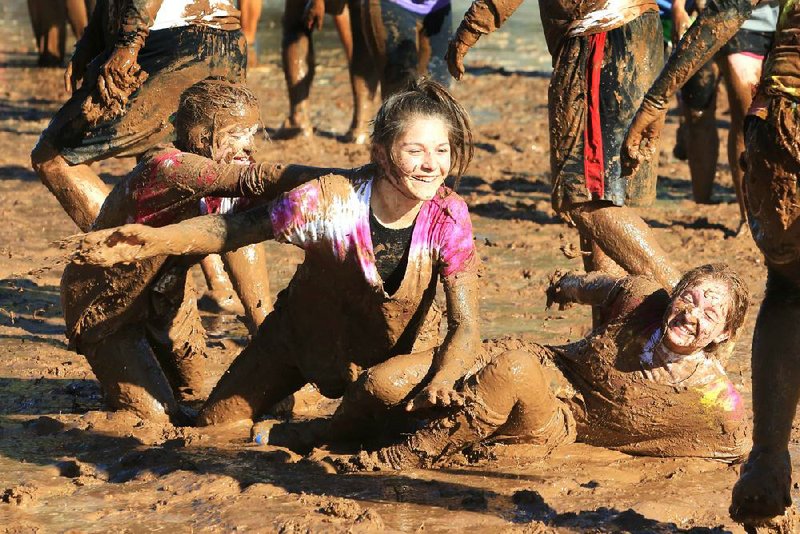 Getting your clothes dirty is not only OK, it’s unavoidable at the annual Mud Run.