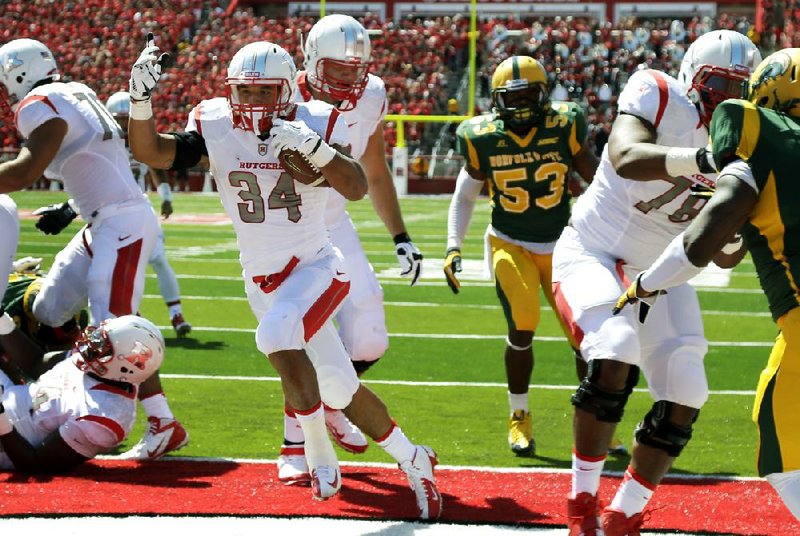 Rutgers running back Paul James (34) scores a touchdown against Norfolk State during the first half of an NCAA college football game in Piscataway, N.J., Saturday, Sept. 7, 2013. (AP Photo/Mel Evans)