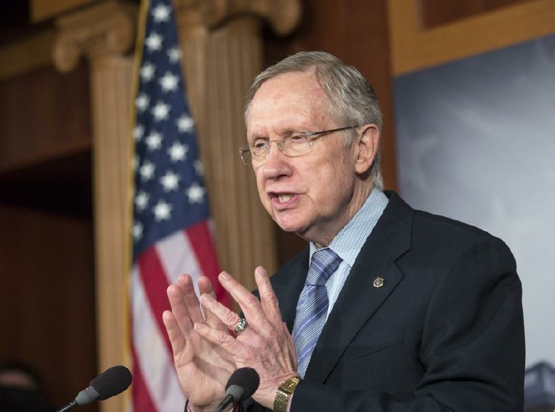 Senate Majority Leader Harry Reid, D-Nev., repeats his pledge to not touch the Affordable Care Act if House Republicans make rescinding Obamacare a part of a continuing resolution to fund the government, on Capitol Hill in Washington, Thursday, Sept. 19, 2013. (AP Photo/J. Scott Applewhite)