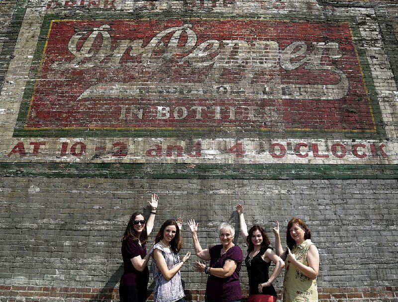 Arkansas Democrat-Gazette/JOHN SYKES JR. - Tuesday Style secondary story on the vintage Dr. Pepper sign that was recently uncovered. From left, Elizabeth Darr, Anna Grace Darr, Jerry Kemp, Sarah Holderfield, Kerry Kemp.

Darrs are mother and daughter, Holderfield and Kemp are daughter and mother; Jerry Kemp is matriarch.