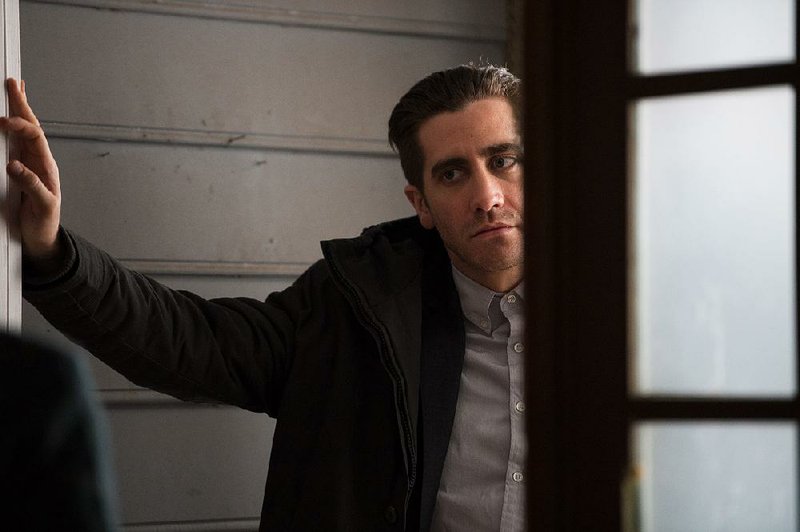 Caption: JAKE GYLLENHAAL as Detective Loki in Alcon Entertainment's dramatic thriller "PRISONERS," a Warner Bros. Pictures release.