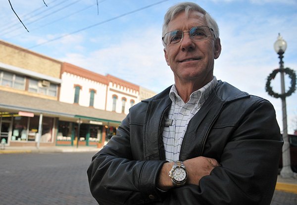 Main Street Roger director, Kerry Jensen posed for a photo in downtown Rogers Wednesday afternoon.