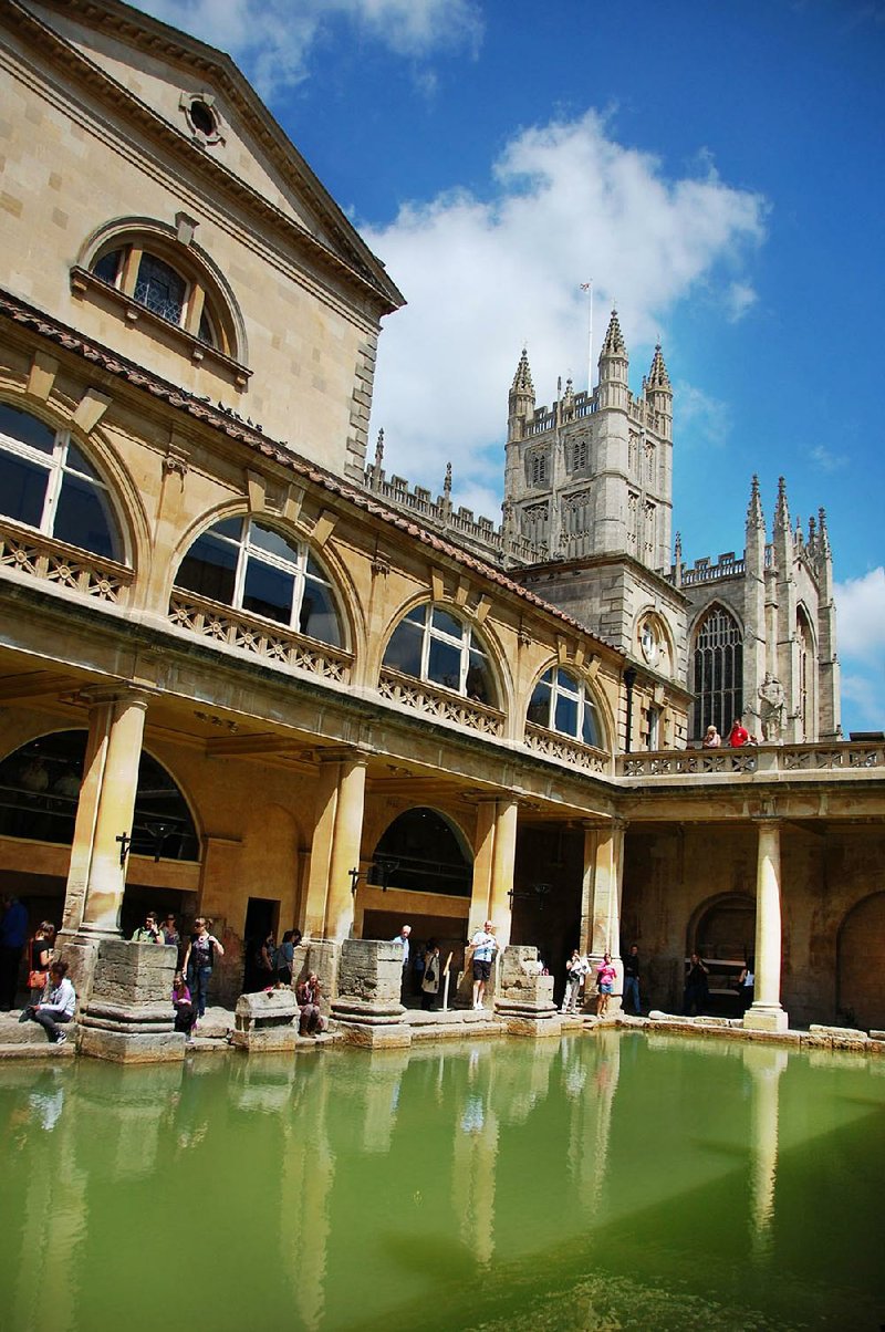 The Great Bath, fed with hot spring water, was perfect for a luxurious swim in Roman times (notice Bath‚Äôs abbey in the distance).
steves - great bath