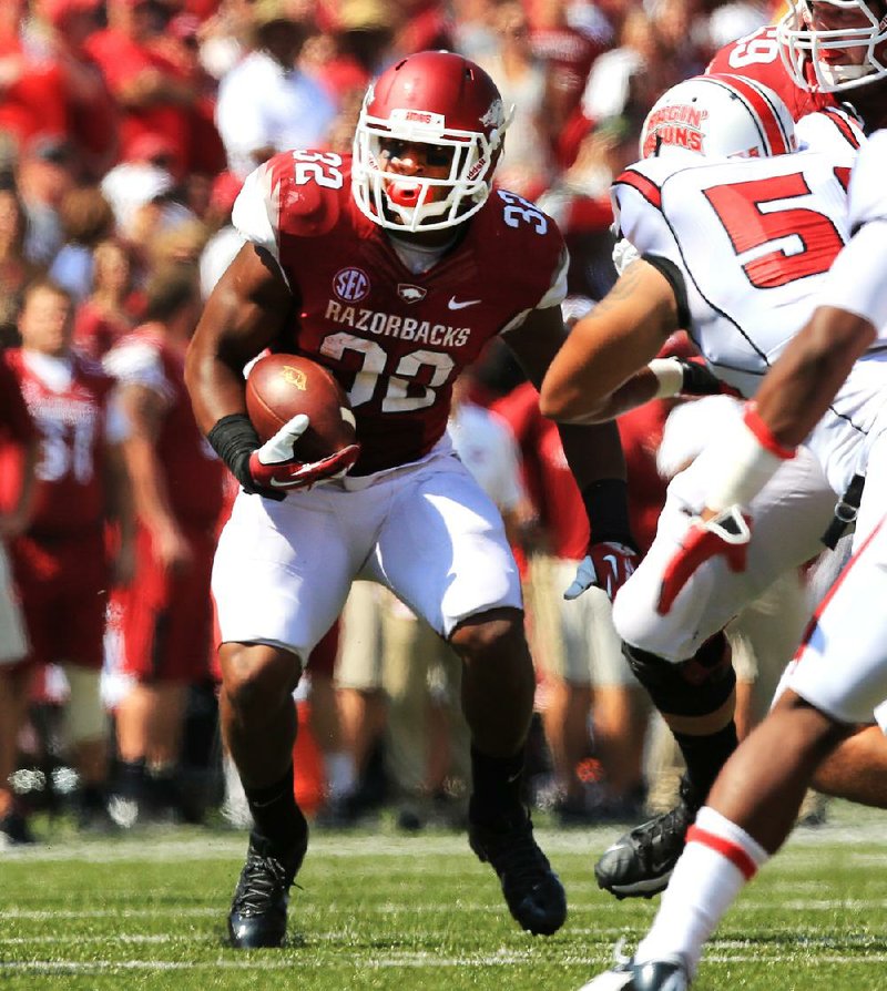 Key matchup
Arkansas run game vs. Texas A&M defense One week after being held to 101 rushing yards at Rutgers last weekend, the Razorbacks’ ground game with Jonathan Williams (above) has a chance to control the clock against an Aggies defense that is yielding 218.3 yards per game. If Arkansas is methodically moving the chains, Johnny Manziel and the rest of A&M’s 50.3-point-per-game offense stay on the bench. 