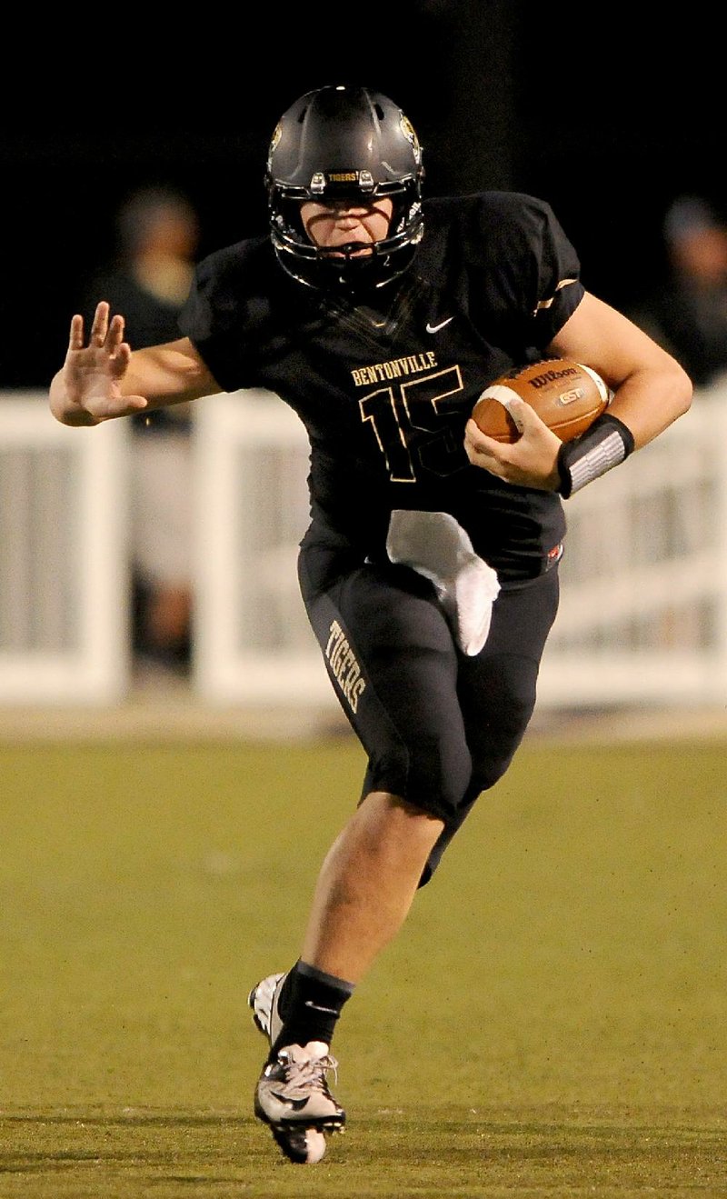 Bentonville quarterback Kasey Ford threw four touchdown passes to lead the Tigers to a 45-20 victory over Springdale Har-Ber on Friday in Bentonville. Ford completed two scoring passes to Jimmie Jackson for 52 yards and 46 yards, and one each to Cody Scroggins (24 yards) and Hunter Smithpeters (28). 