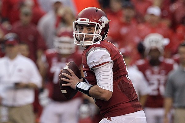 Arkansas quarterback Brandon Allen prepares to pass during the first quarter of an NCAA college football game against Texas A&M in Fayetteville, Ark., Saturday, Sept. 28, 2013. (AP Photo/Danny Johnston)