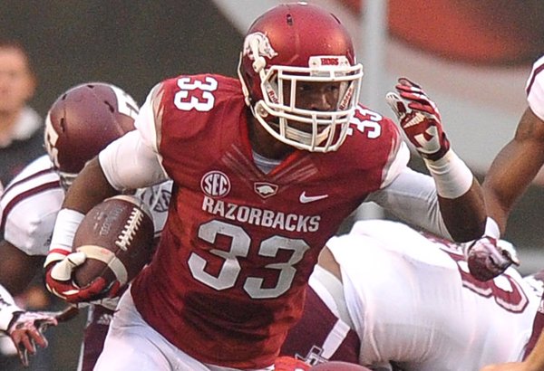 Arkansas freshman Korliss Marshall returns a kick for a big gain against Texas A&M Saturday at Donald W. Reynolds Razorback Stadium.