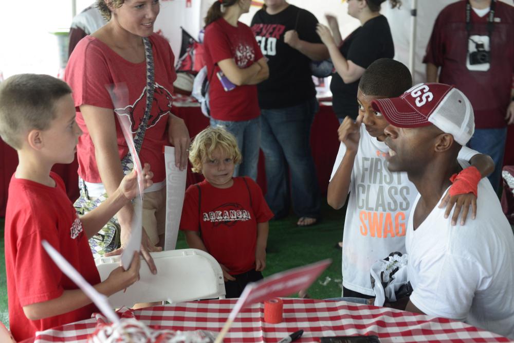 STAFF PHOTO ANTHONY REYES
The Northwest Arkansas Children’s Shelter’s fourth annual Tailgate for the Kids event Saturday, Sept. 28, 2013 in the Tyson Foods parking lot in Fayetteville. The event is to raise money for the Northwest Arkansas Children's Shelter.