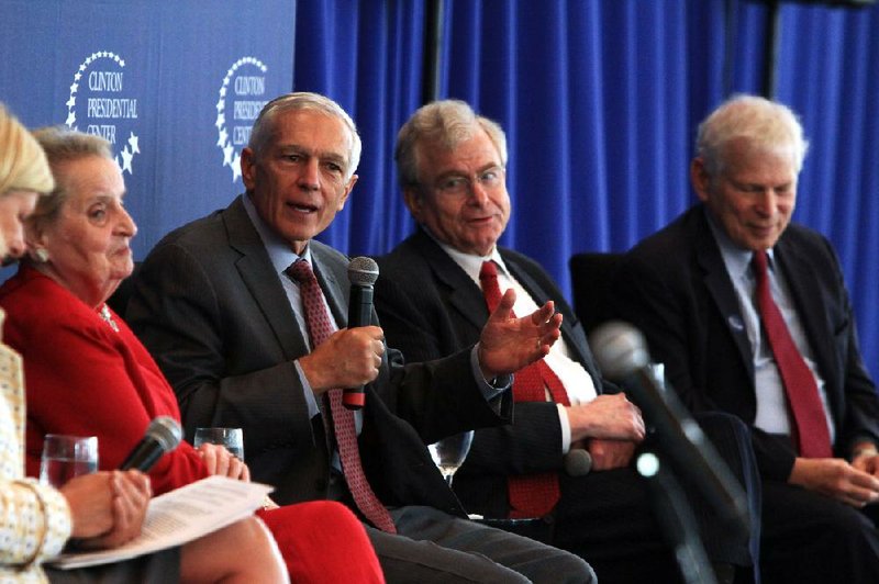 Madeleine Albright (from left), Wesley Clark, Sandy Berger and Leon Fuerth talk about newly declassified documents on the 1992-95 Bosnian conflict Tuesday at the Clinton presidential library in Little Rock. 