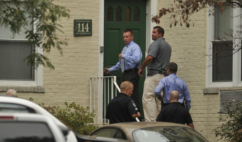 Law enforcement from local, state and federal jurisdictions investigate the residence of Miriam Carey in Stamford, Conn. Thursday, Oct. 3, 2013. Law-enforcement authorities have identified Carey, 34, as the woman who, with a 1-year-old child in her car, led Secret Service and police on a harrowing chase in Washington from the White House past the Capitol Thursday, attempting to penetrate the security barriers at both national landmarks before she was shot to death, police said. The child survived. 
