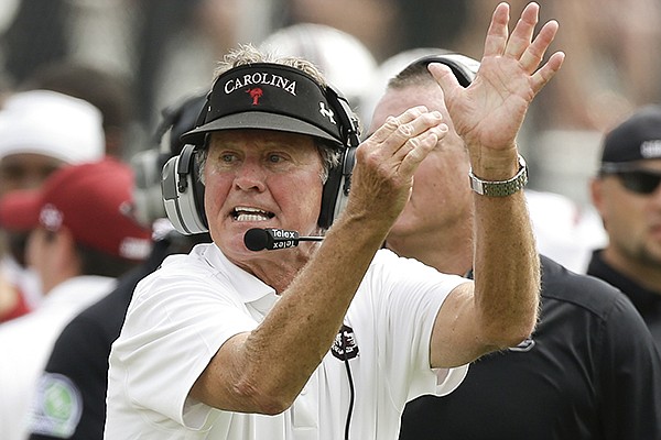 South Carolina head coach Steve Spurrier calls for a timeout against Central Florida during the second half of an NCAA college football game in Orlando, Fla., Saturday, Sept. 28, 2013. South Carolina won the game 28-25.(AP Photo/John Raoux)