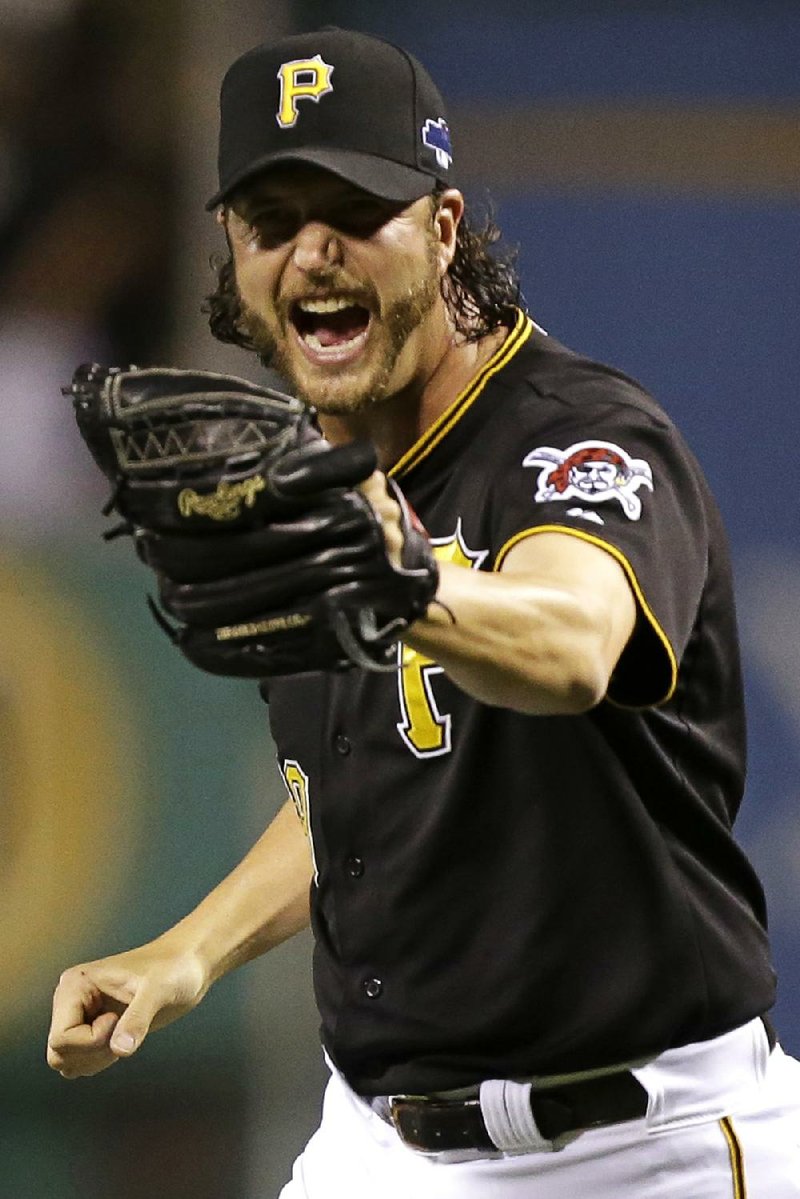 Pittsburgh Pirates closer Jason Grilli celebrates after getting the final out of Game 3 of a National League division baseball series against the St. Louis Cardinals on Sunday, Oct. 6, 2013 in Pittsburgh. The Pirates won 5-3, to take a two game to one lead in the best of five series. (AP Photo/Gene J. Puskar)