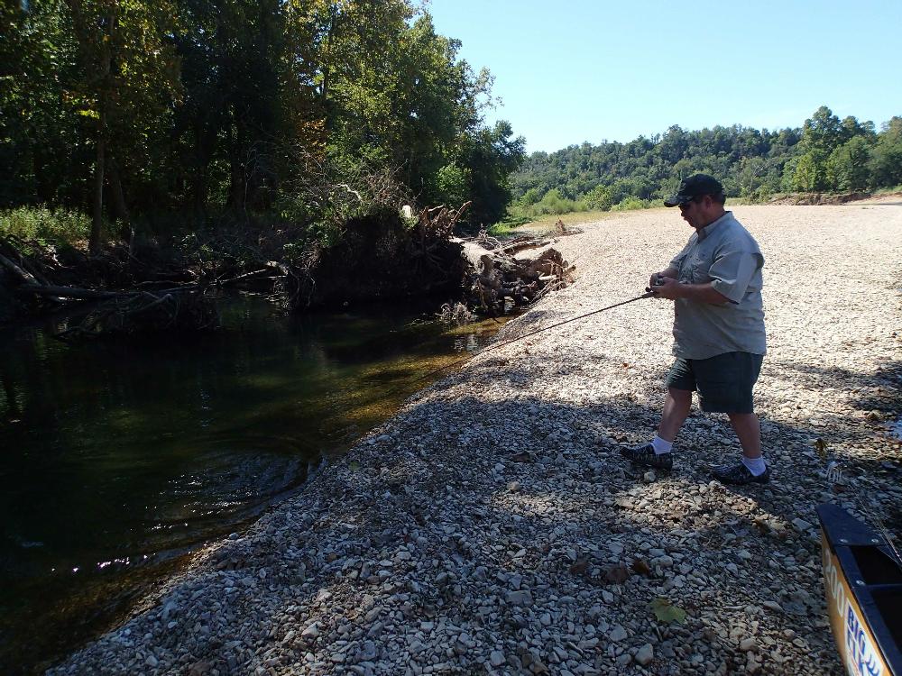Duncan fishes in a backwater during a gravel-bar lunch break where he caught the day's biggest smallmouth bass.