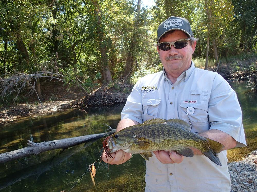 This smallmouth bass that Duncan caught from a backwater was big smallmouth of the day.